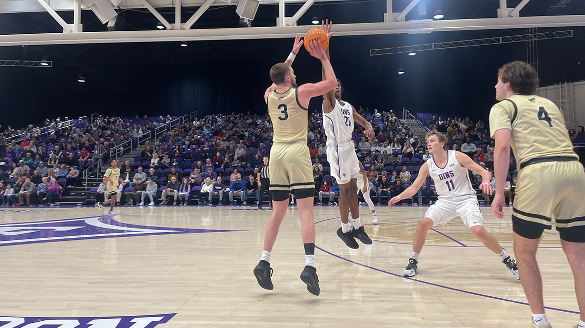 Trojans Stun Paladins in 79-74 Exhibition Win in Timmons Arena